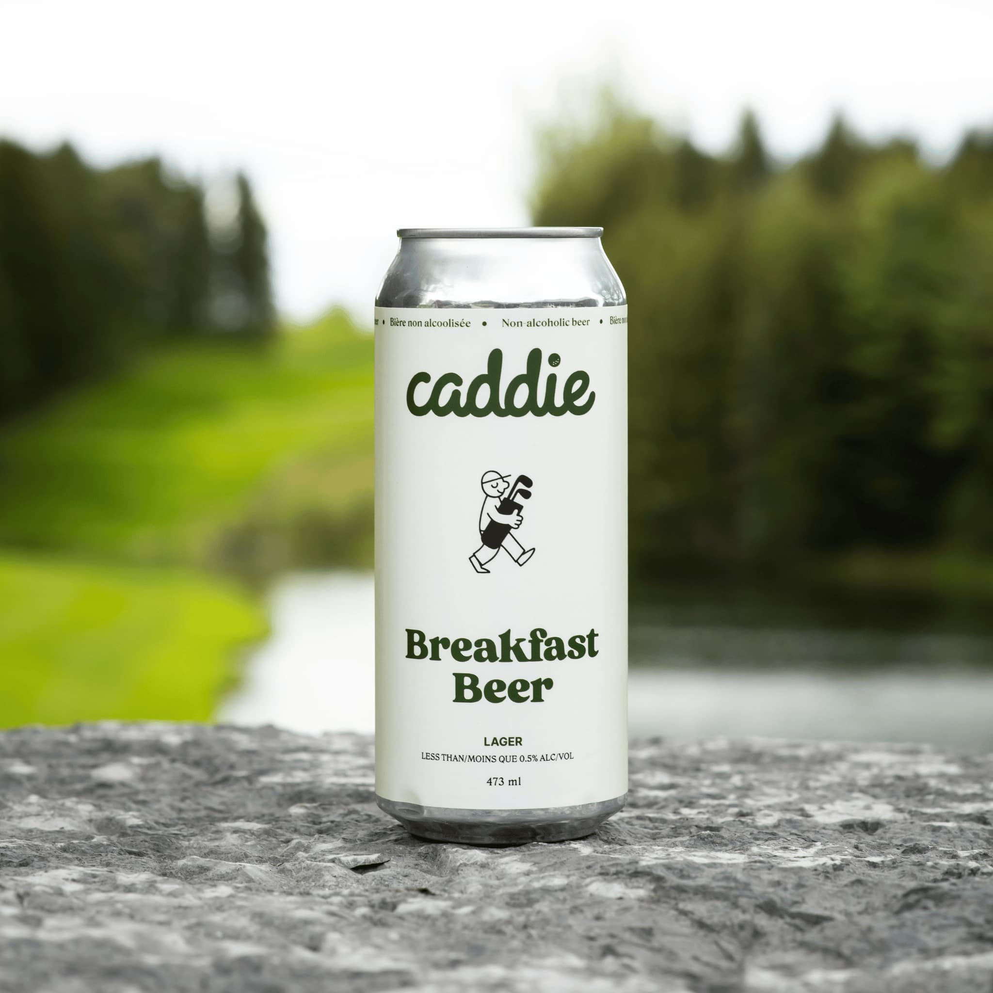Caddie Breakfast Beer with golf course in background
